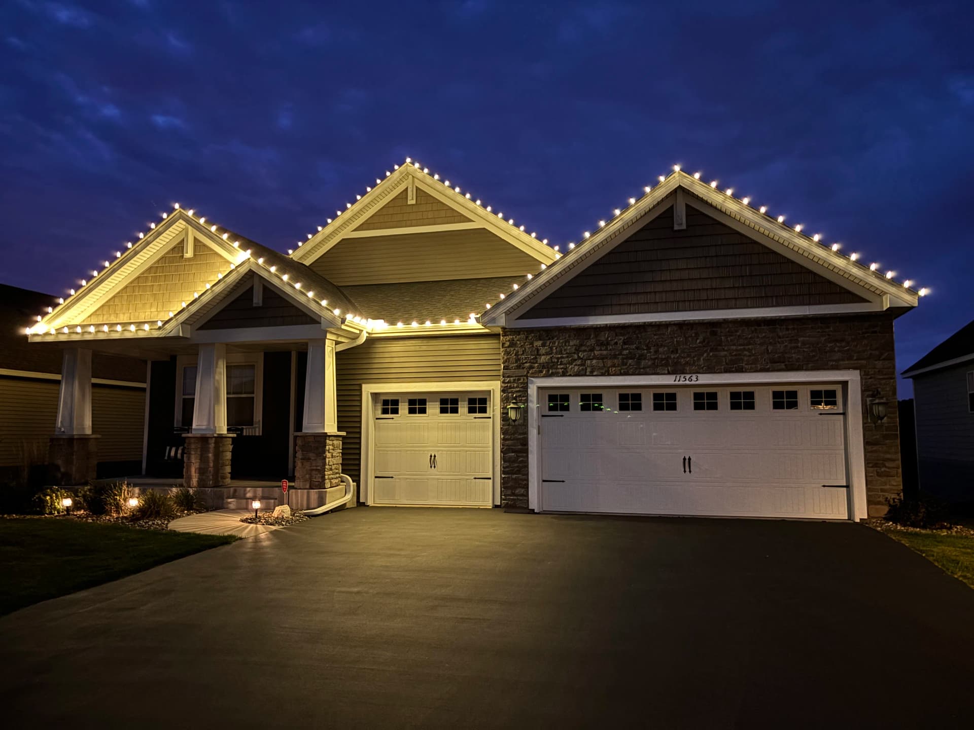 Warm White Christmas Lights Done Right on This Craftsman Home image